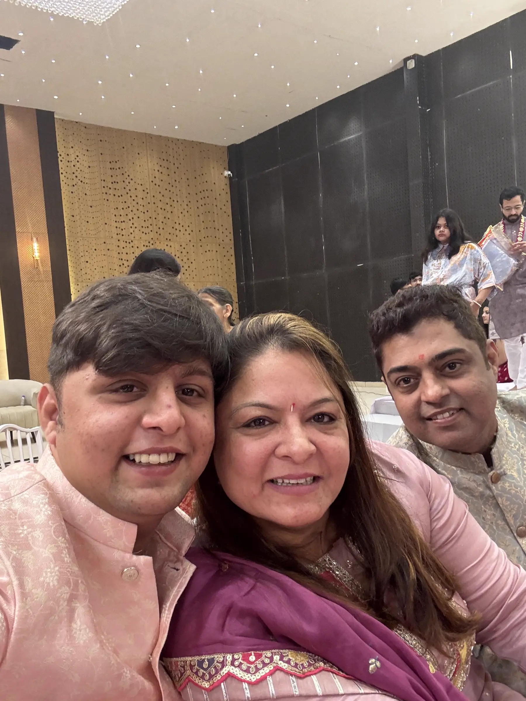 Family gathered closely for a selfie