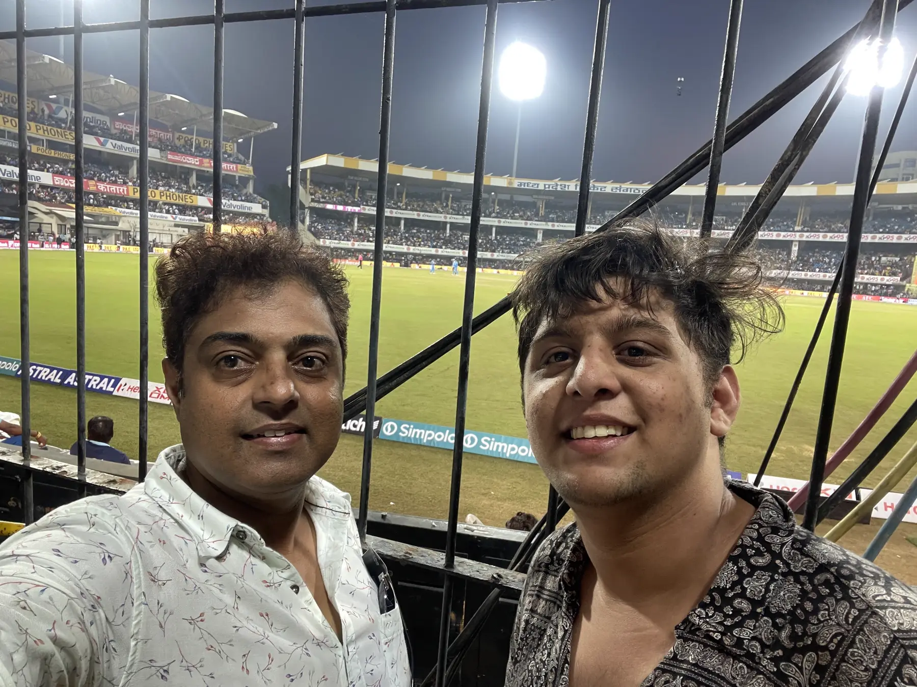 Father and son smiling together